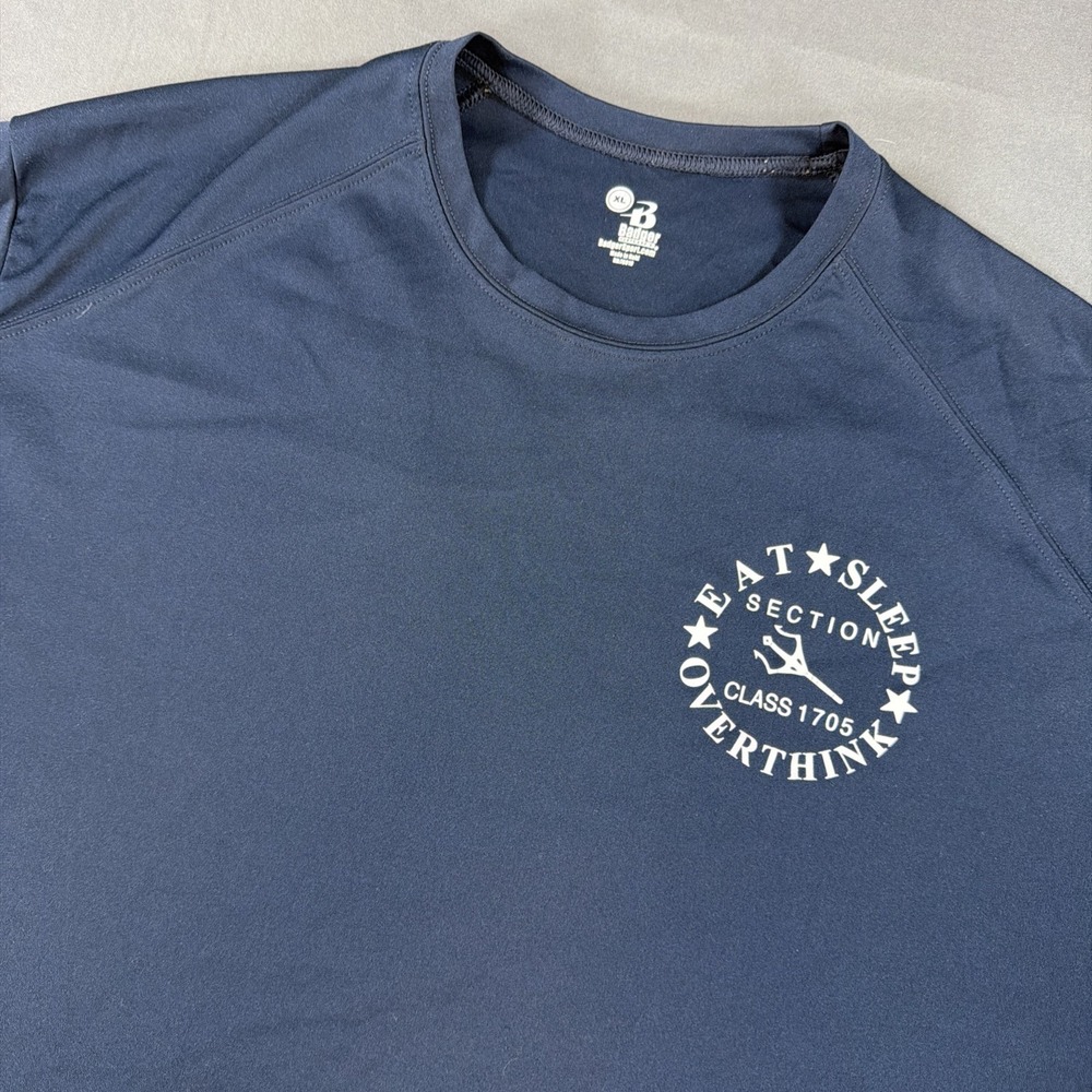 navy blue short-sleeve athletic t-shirt featuring a small circular chest Xl